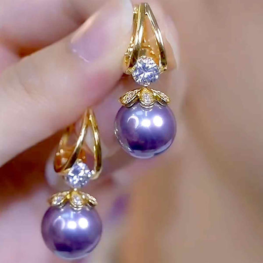 Pendientes de plata con perlas de lujo francés de nuevo estilo 2025