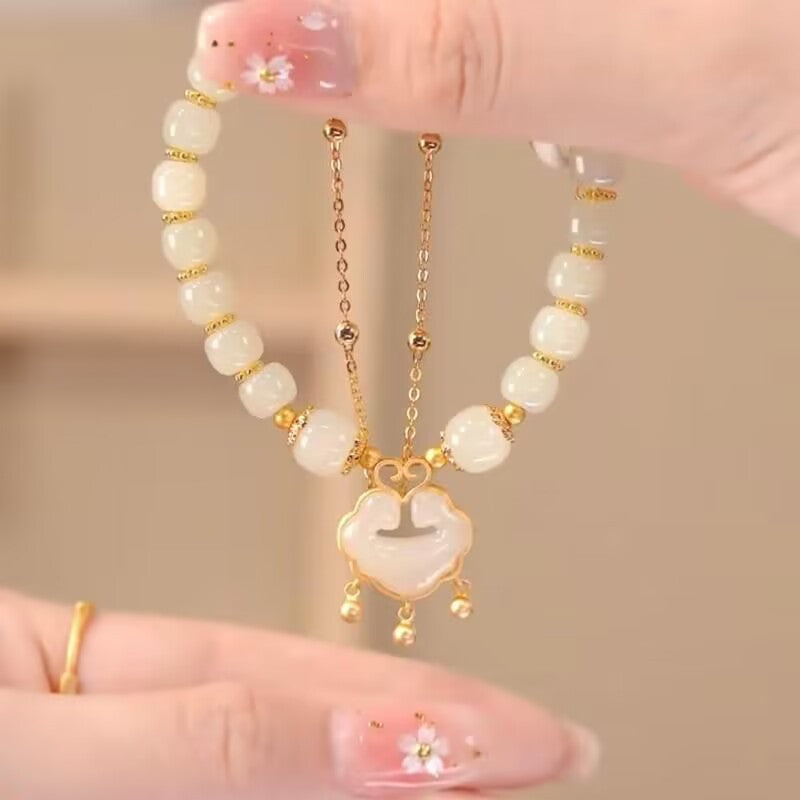 ✨【Compre uno y llévese otro gratis】Nueva pulsera de jade hetiano en oro de 14 quilates