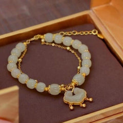 ✨【Compre uno y llévese otro gratis】Nueva pulsera de jade hetiano en oro de 14 quilates