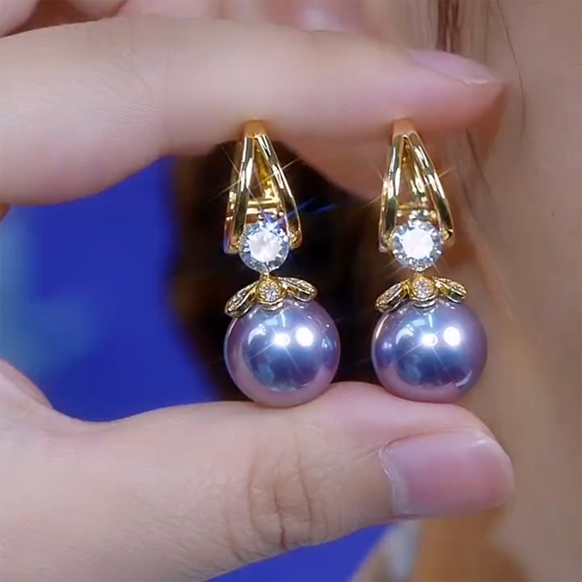 Pendientes de plata con perlas de lujo francés de nuevo estilo 2025
